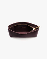 Small zippered leather pouch with open top view