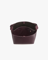 Open tote bag with a wide handle and spacious interior.