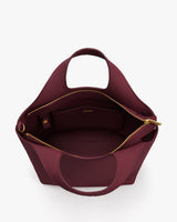 Open handbag with a zippered pocket and an open compartment