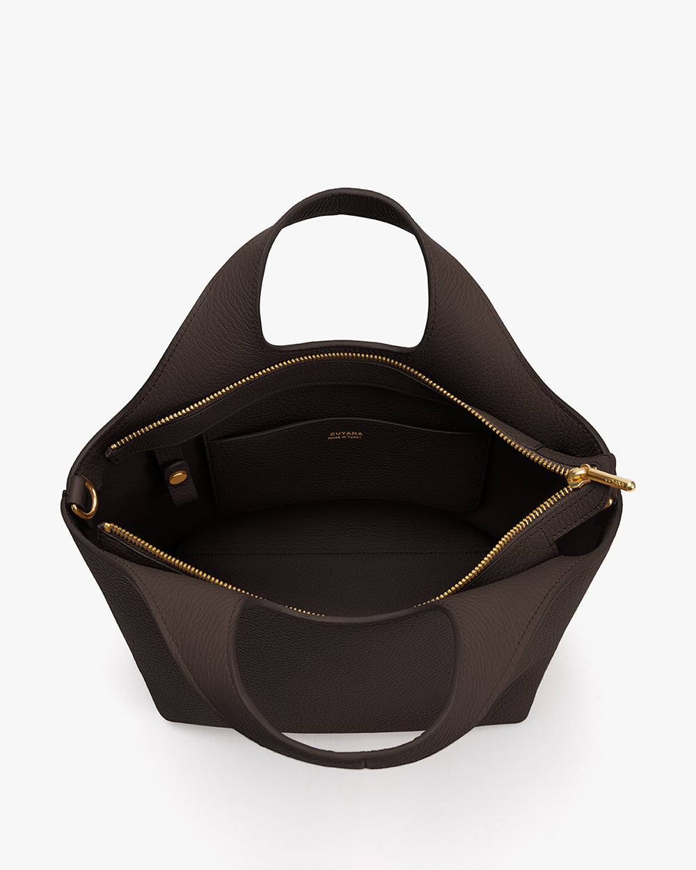 Open handbag with a zipper, showing an interior pocket and handle.
