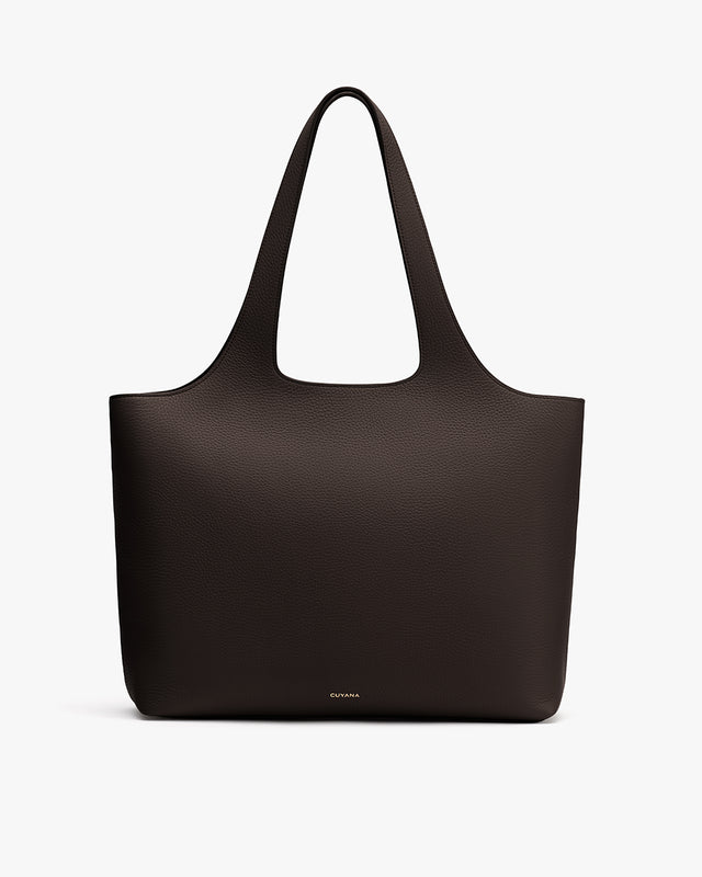 Tote bag with two handles and brand logo near the base.