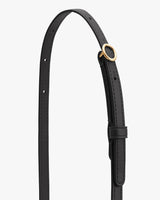 Thin adjustable strap with a round buckle.