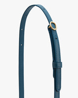 Bag strap with an adjustable buckle and multiple holes