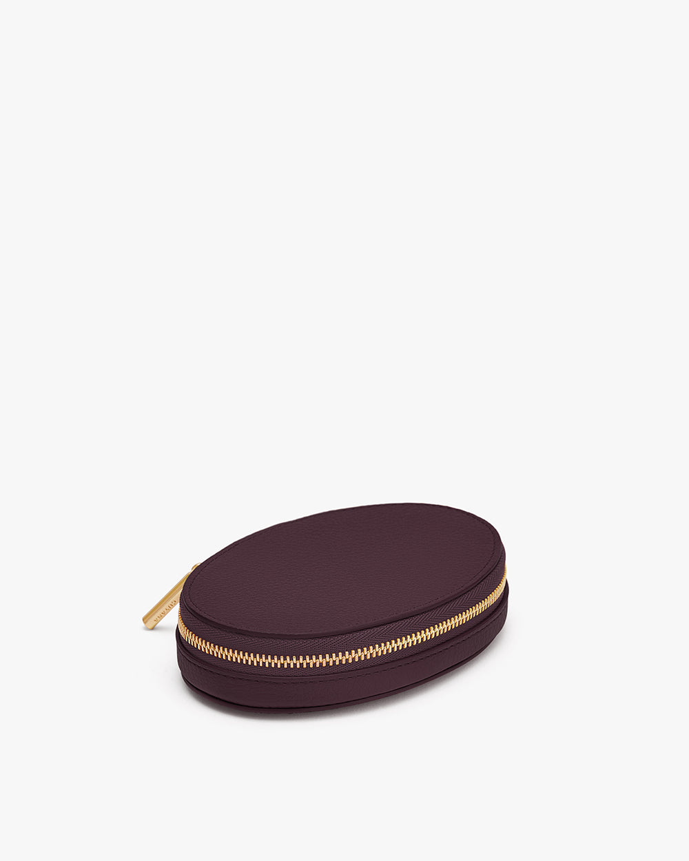 Oval zippered case on white background
