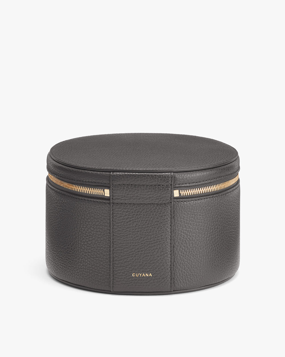 Round jewelry box with zipper on white background.