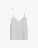 Sleeveless top with spaghetti straps and a V-neckline, hanging on a hook.