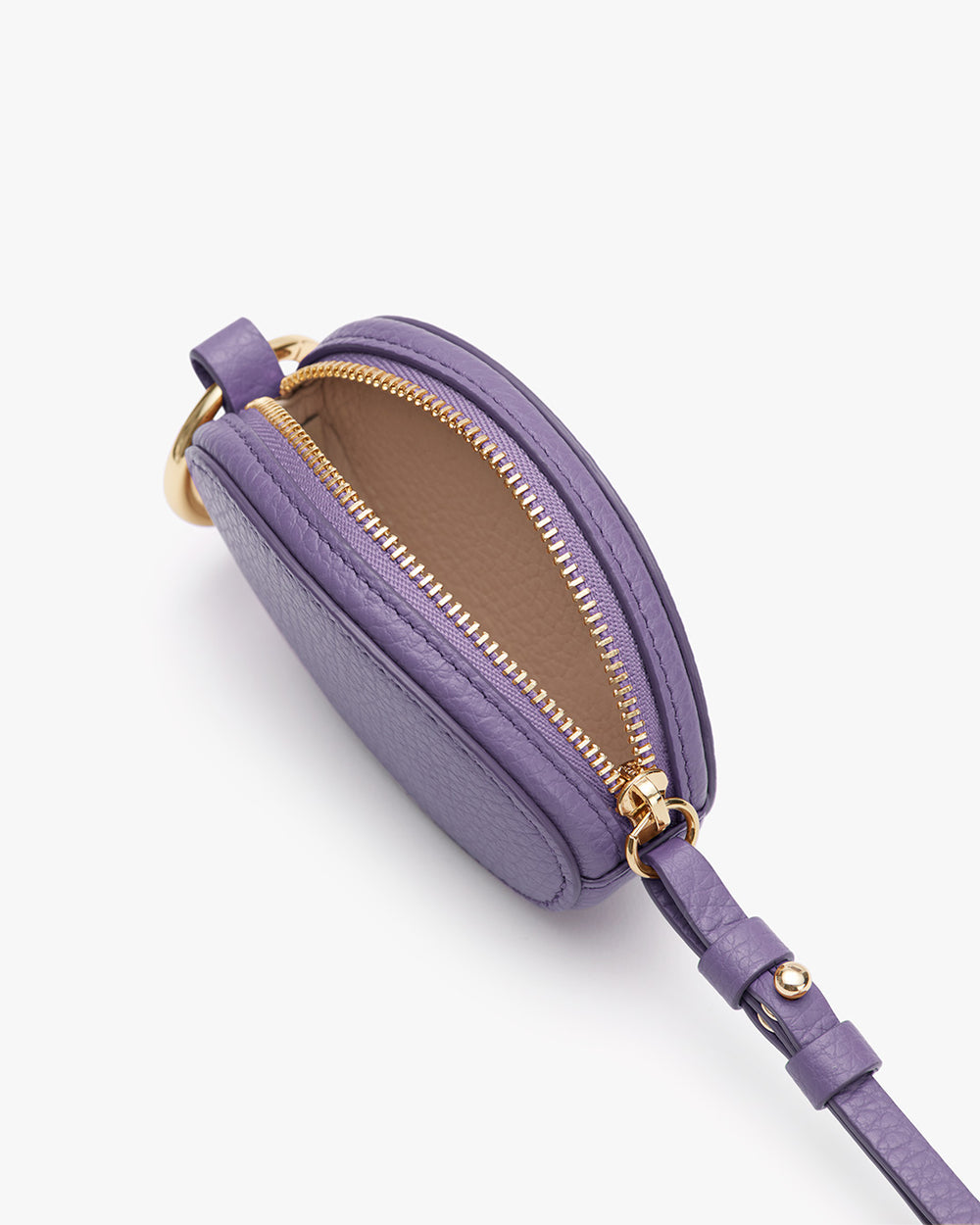 Small purse with zipper open, attached to a strap with metal hardware.