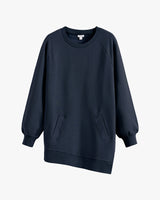 Sweatshirt with long sleeves and crew neckline, displayed on plain background.