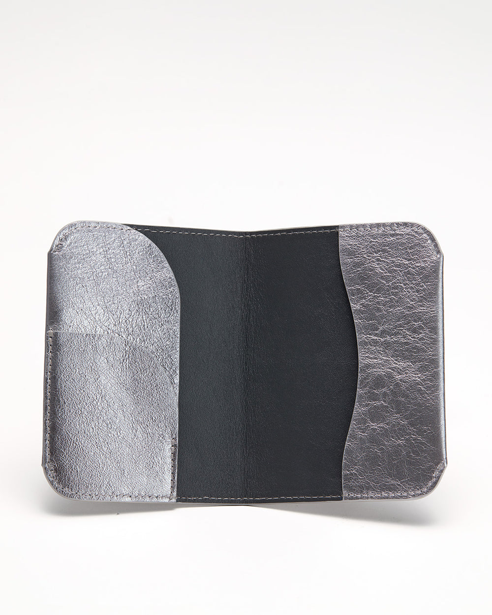 Open wallet on a plain background