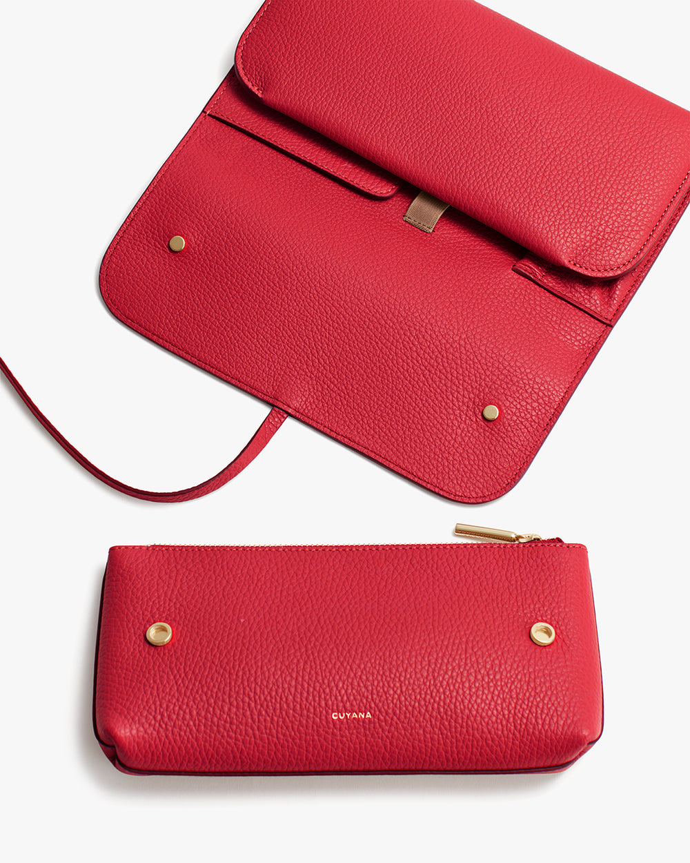 Two red handbags, one open with visible flap, and one closed with zipper.