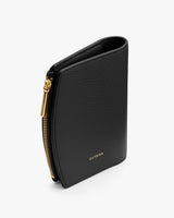 Wallet with zipper and branding on surface.