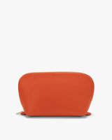 Small pouch with zipper on plain background.