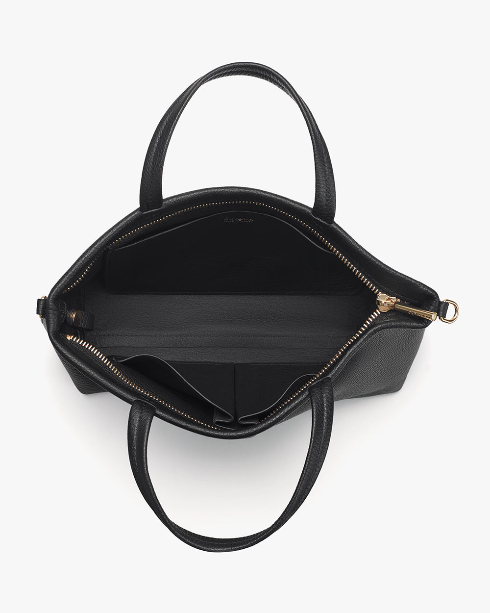 Top view of an open handbag with zipper and two handles.