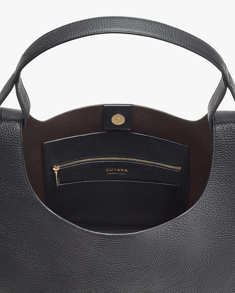 Open handbag showing interior and zipper pocket.
