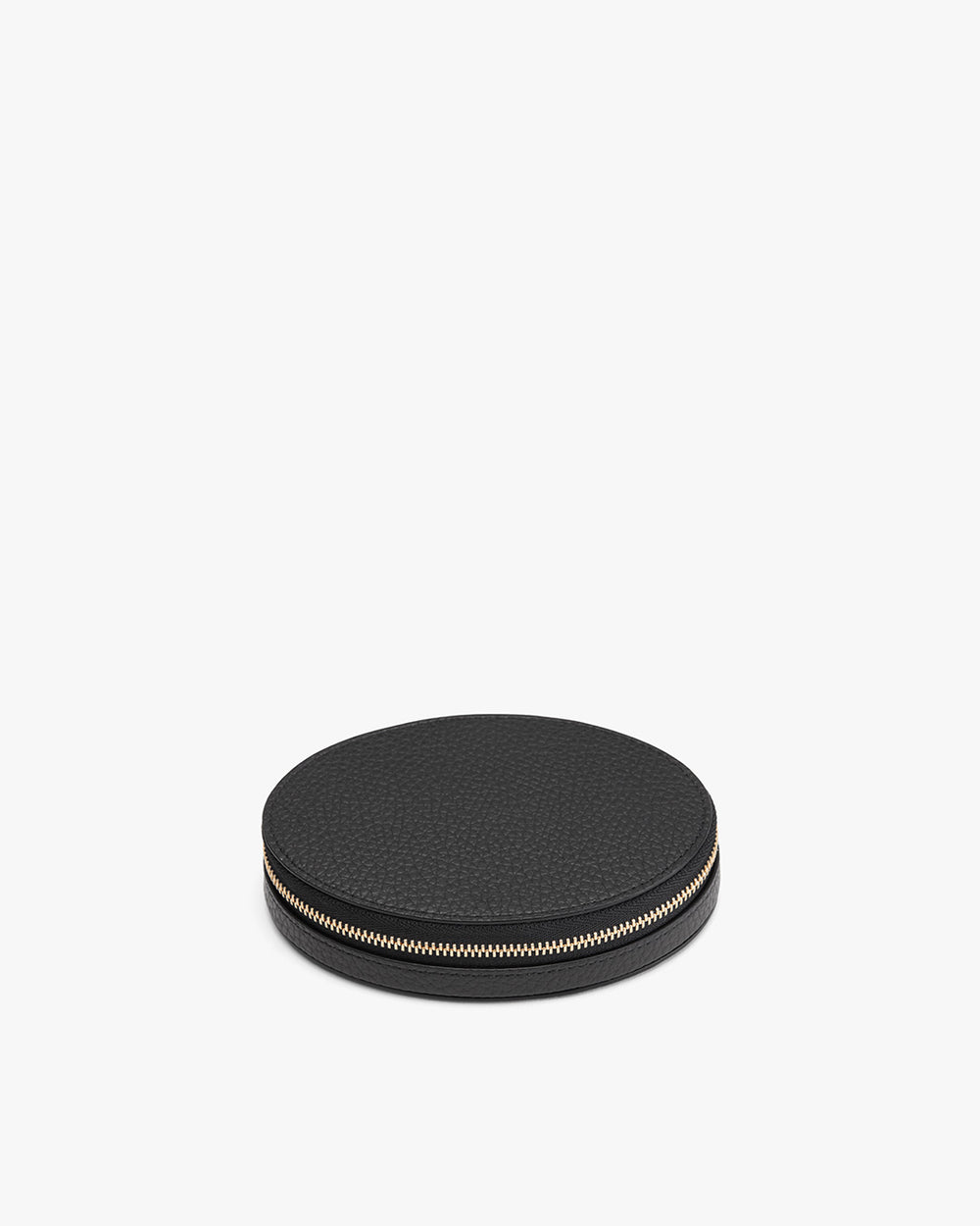 Round object with a zipper on a plain background.