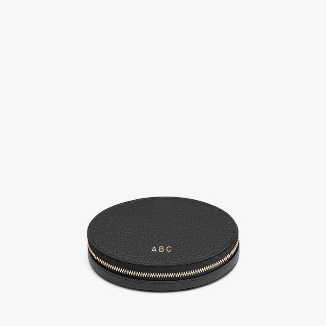 Round case with zipper and initialed top