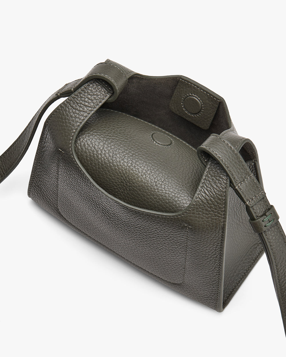 Open handbag with a flap and shoulder strap.