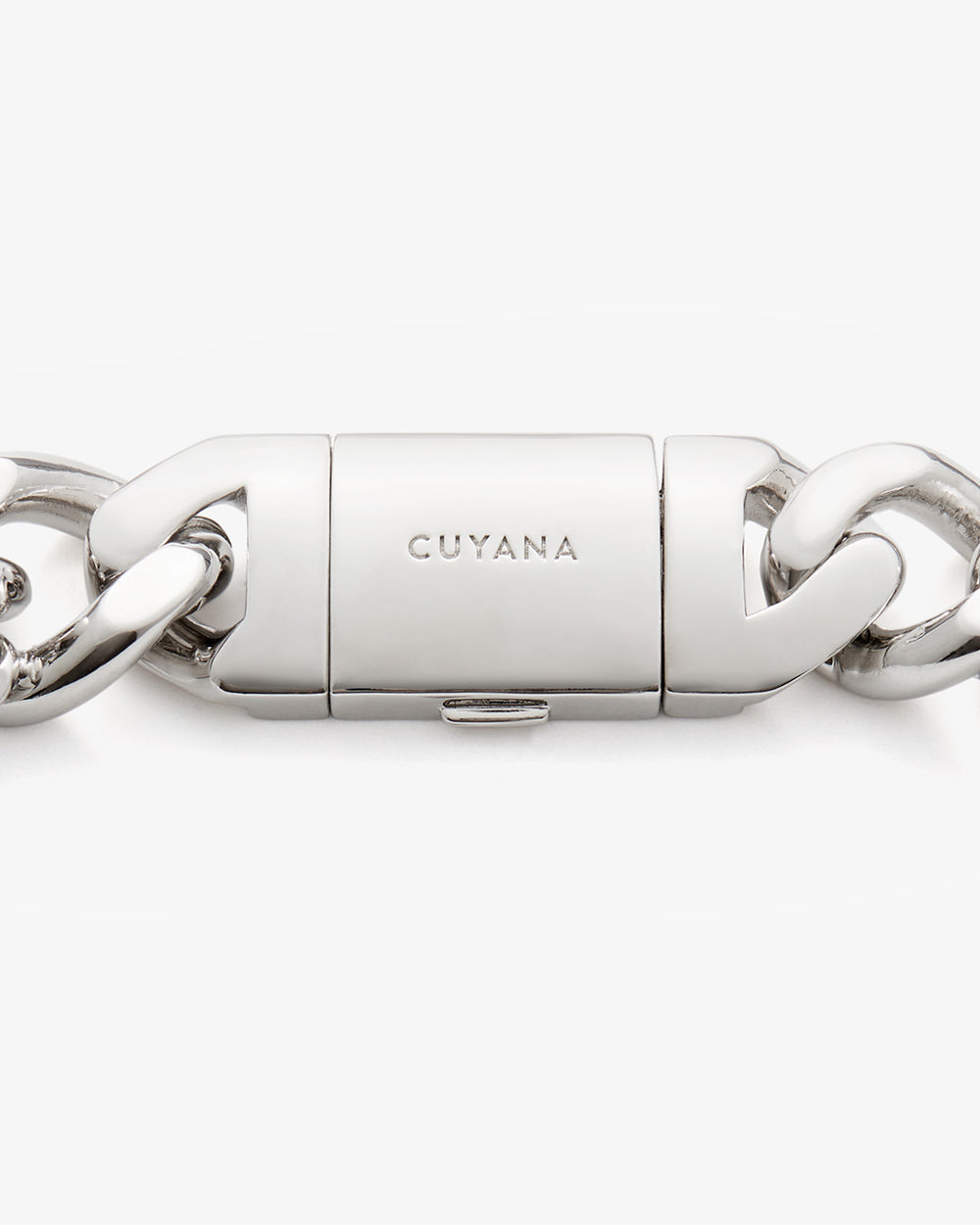 Close-up of a clasp with engraved brand name on a chain.