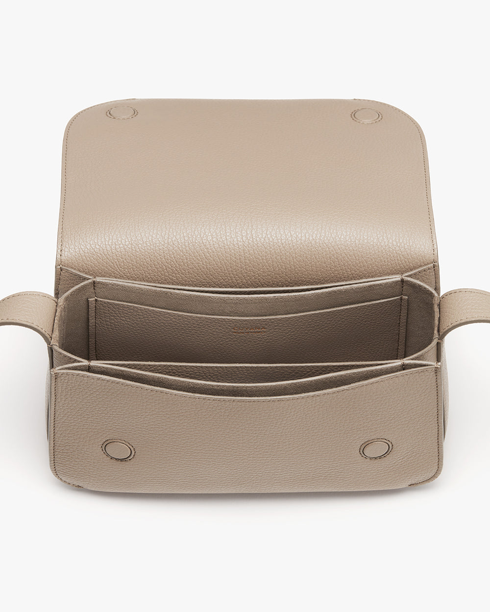 Open leather bag with visible compartments and flap closure.