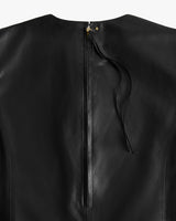 Back view of a leather garment with a zipper closure at the top.