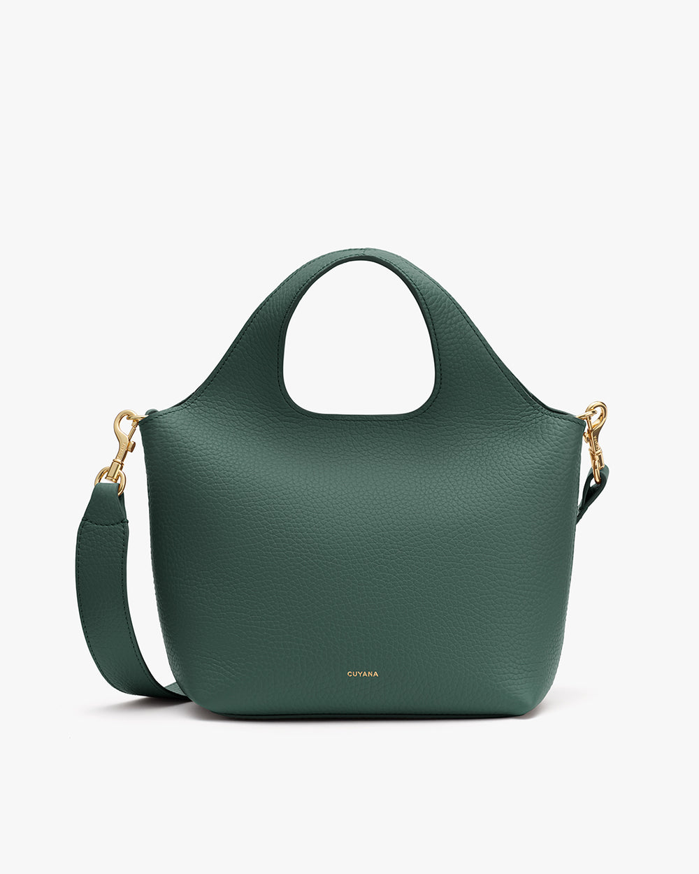 Handbag with a curved handle and detachable strap.