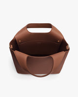 Open tote bag with short handle and wide opening.