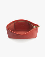 Small open pouch with visible zipper and interior label.