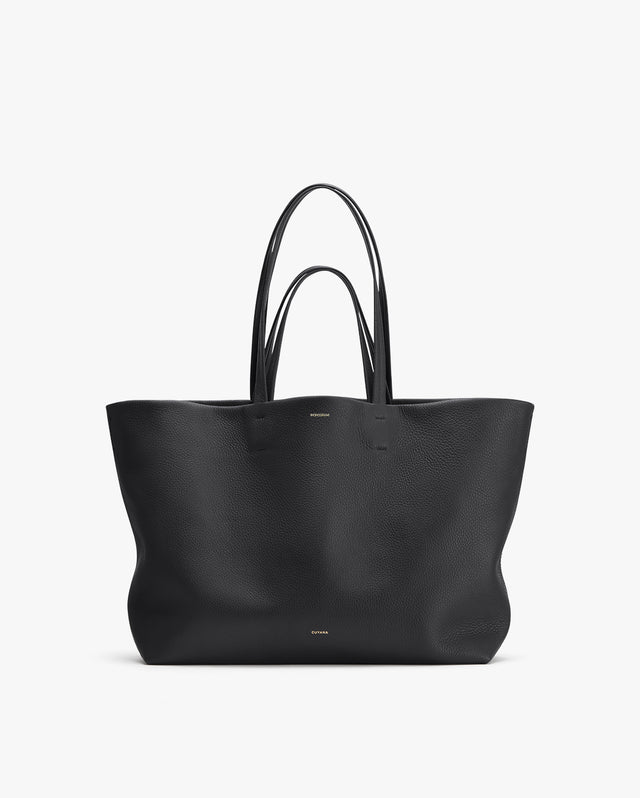 Large tote bag with two handles, standing upright.