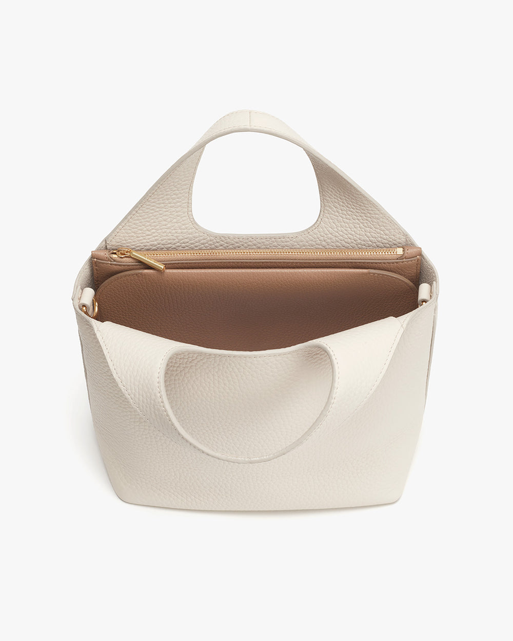 Handbag with a top handle and front flap pocket.