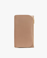 Wallet with a zipper closure standing upright.