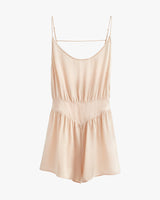 Sleeveless romper with thin straps and an elastic waistband.