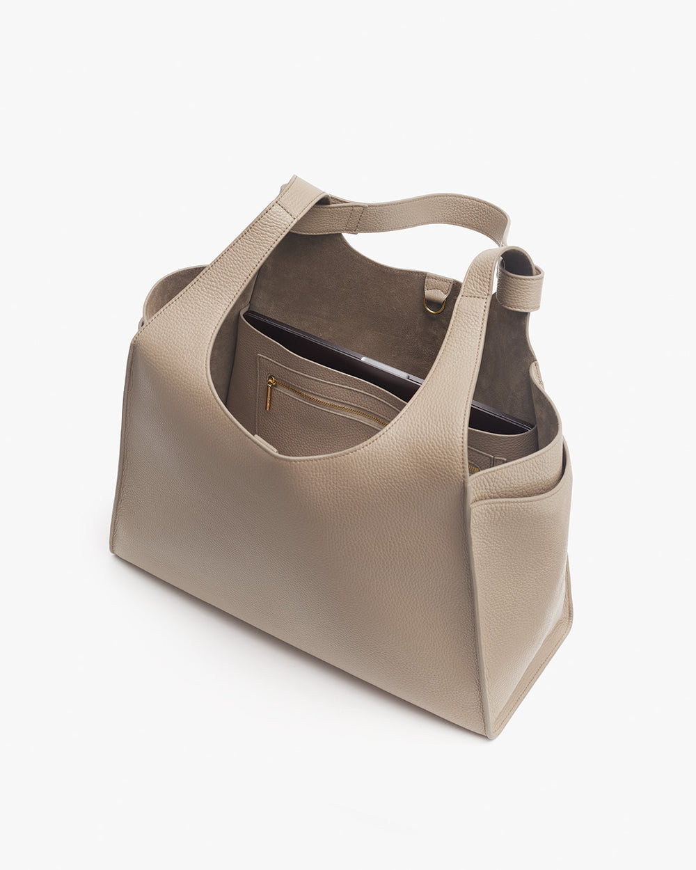 Open handbag with top handles and a visible inner pocket.