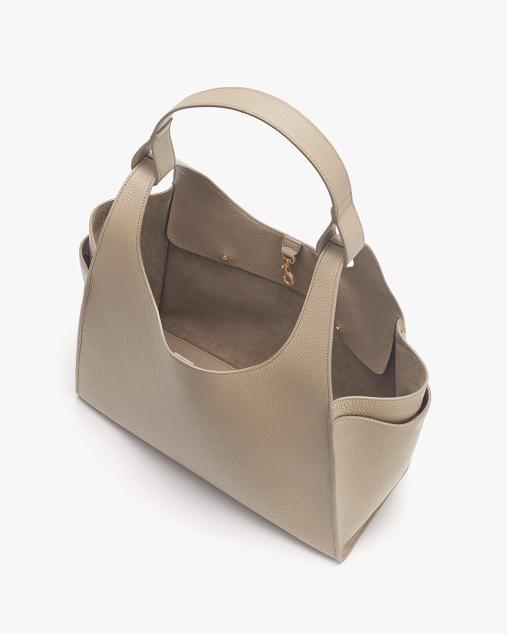 Open tote bag with interior compartments and curved handle.