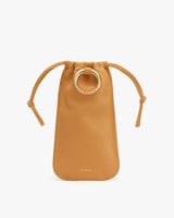 Small drawstring pouch with a large circular ring detail at the top center.