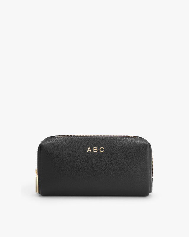 Structured wallet with zipper and personalized initials.