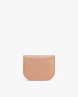 Small leather wallet with curved flap lying on flat surface