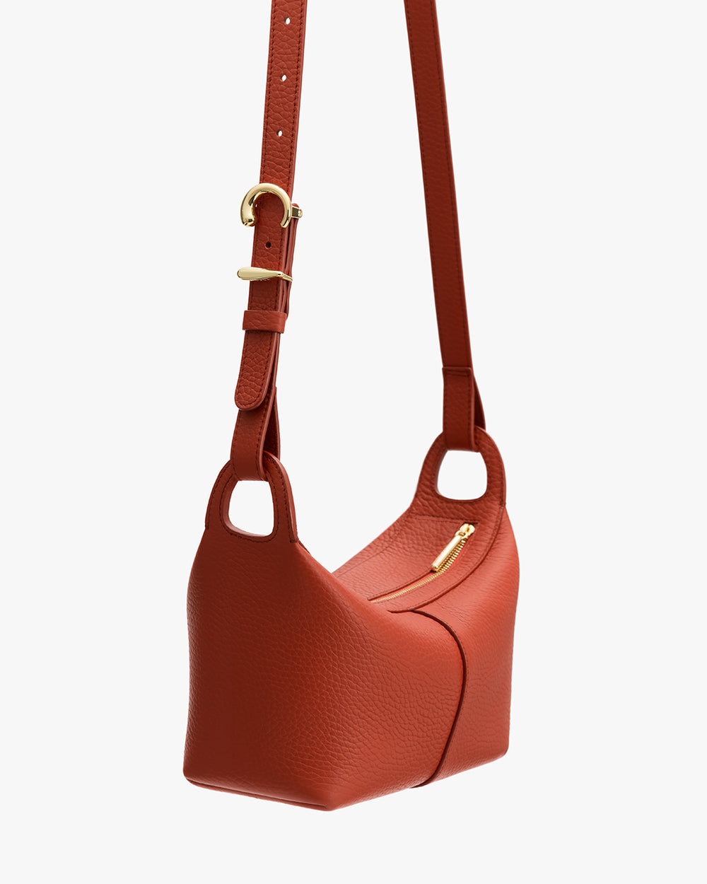 Crossbody bag with gold zipper and adjustable strap