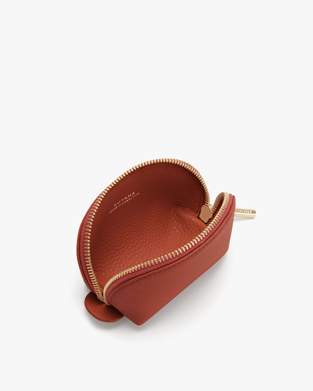 Small zippered pouch partially open with visible interior.