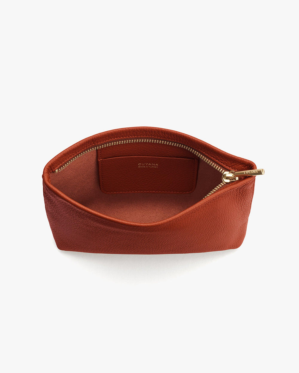 Open leather pouch with visible zipper and inner label.