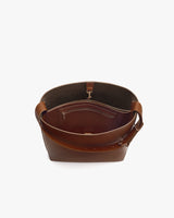 Open bag with wide handle and interior pocket.