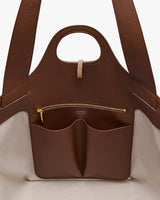 Open tote bag with inner pockets and a zippered compartment