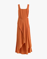 Sleeveless dress with square neckline and asymmetrical hem on white background.