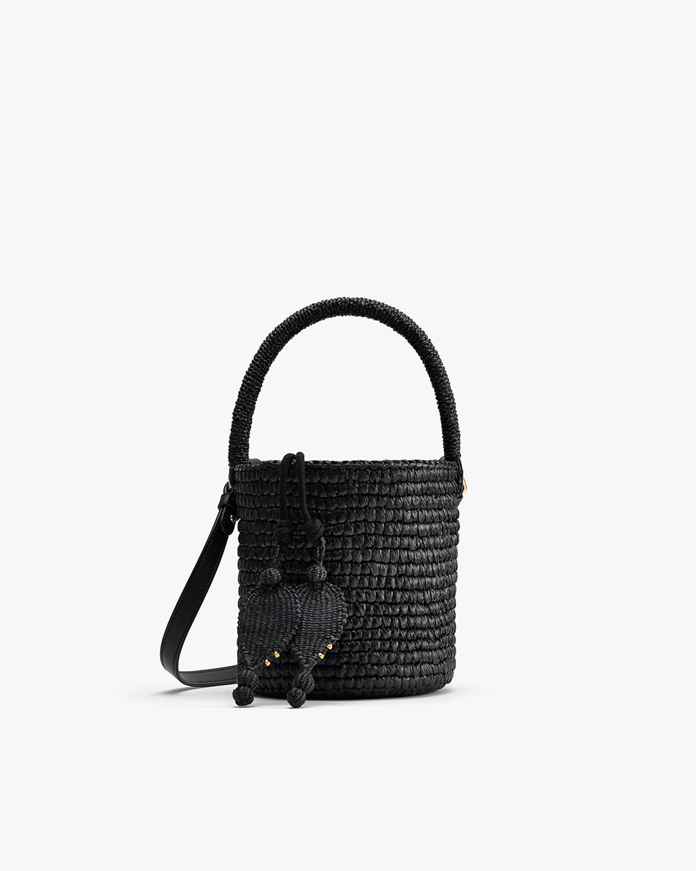 Woven bucket bag with handle and tassel details.
