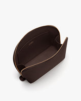 Open leather pouch with visible inner pocket and zipper.