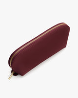 A zippered pouch with a textured surface.