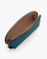 Top view of an open zippered pouch with a spacious interior.