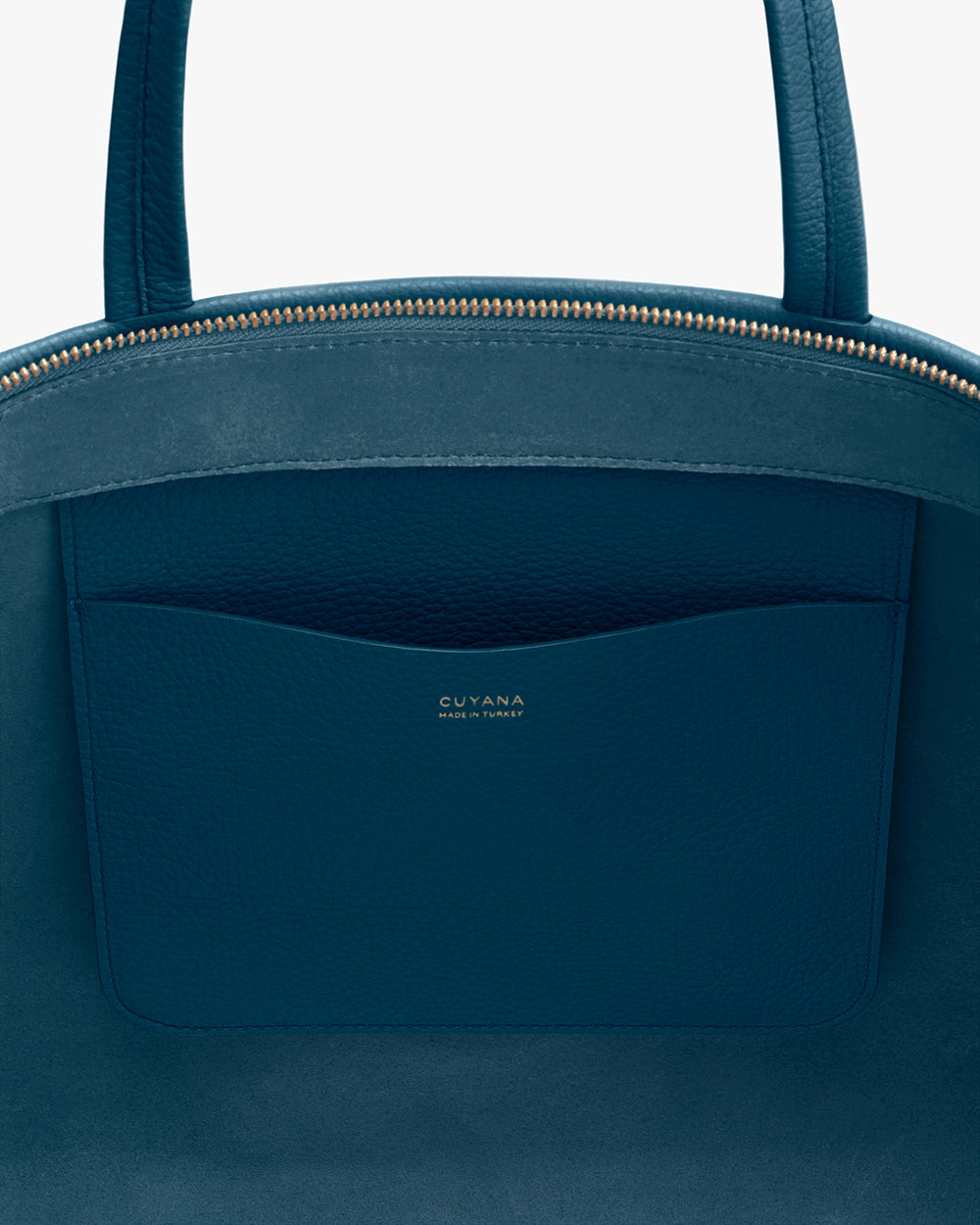 Close-up of a travel bag with visible zipper and pocket.