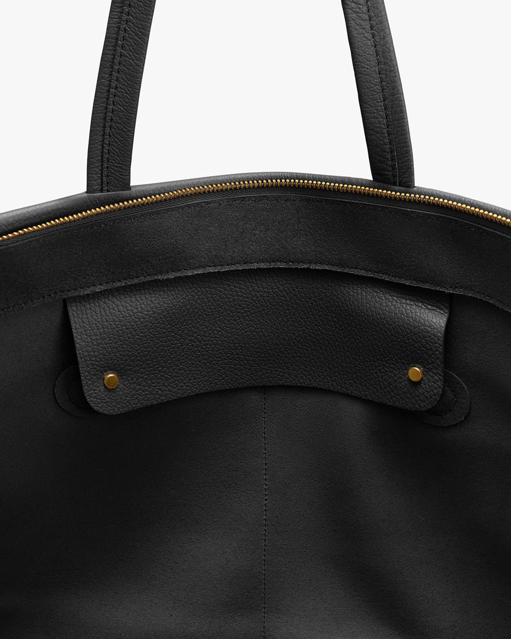 Open travel bag with handles and visible zipper edge