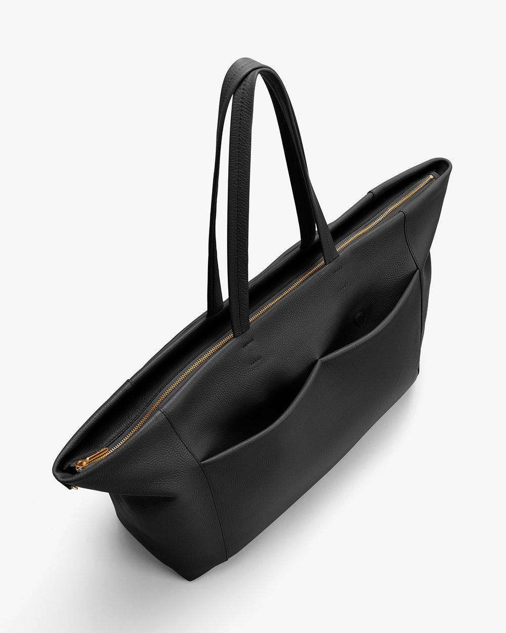 Tote bag with two shoulder straps and zipper closure viewed from a high angle.
