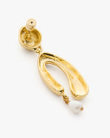 Earring with open loop design and dangling bead.